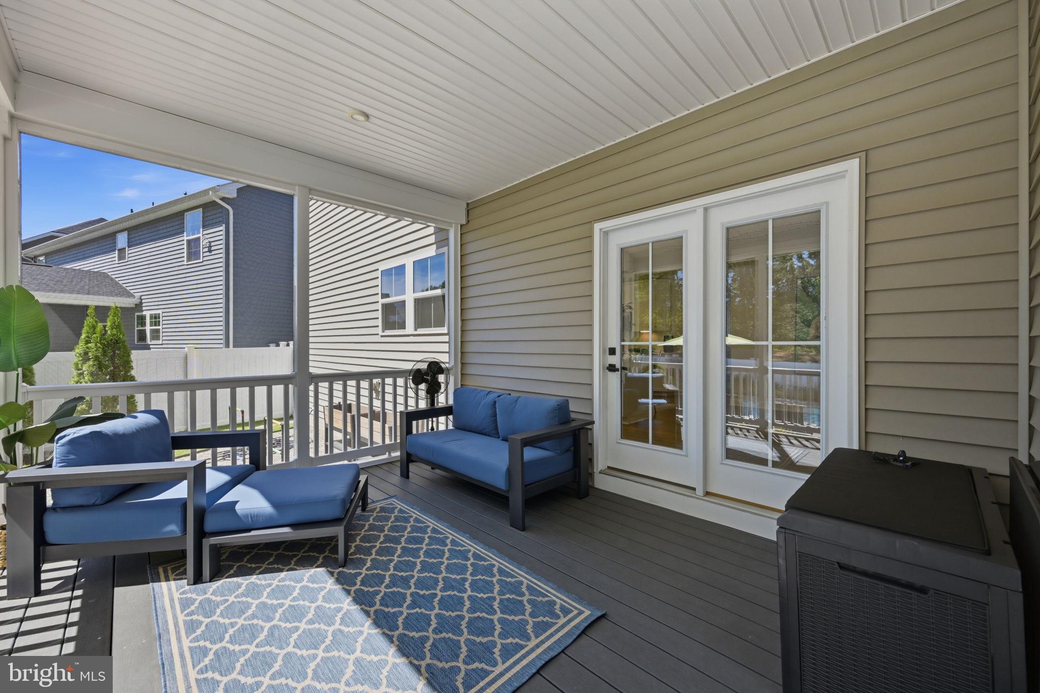 1321 Upper Patuxent Ridge Road Odenton, MD 21113 - Photo 17 of 48 Charming porch for serene moments.