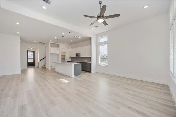 a view of kitchen with cabinets and stainless steel appliances