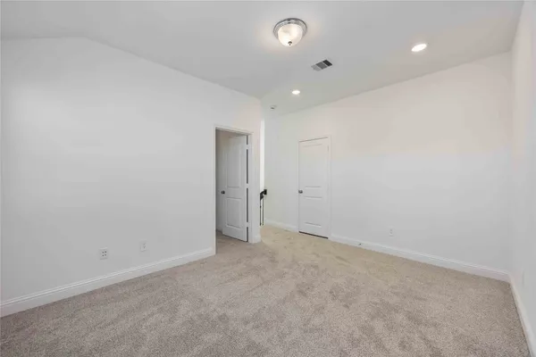 an empty room with an entryway