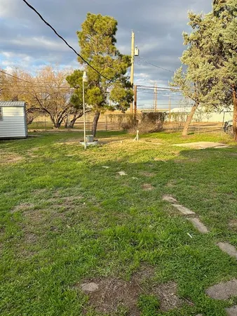 a view of a yard with an outdoor space