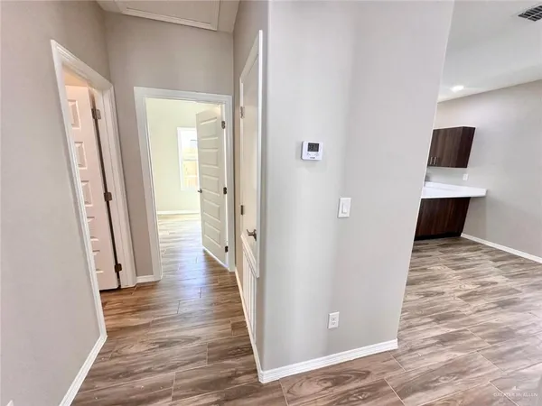a view of kitchen and windows