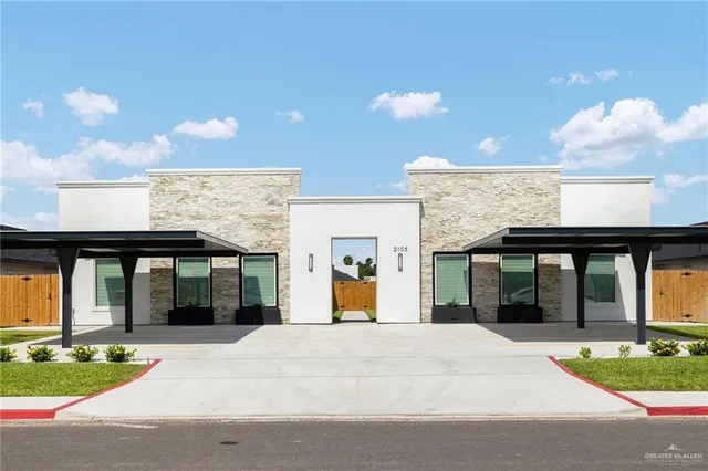 a view of a building with a street