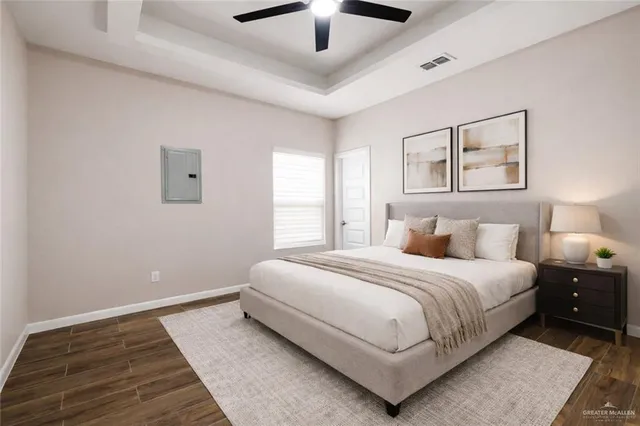 an aerial view of a house with a swimming pool