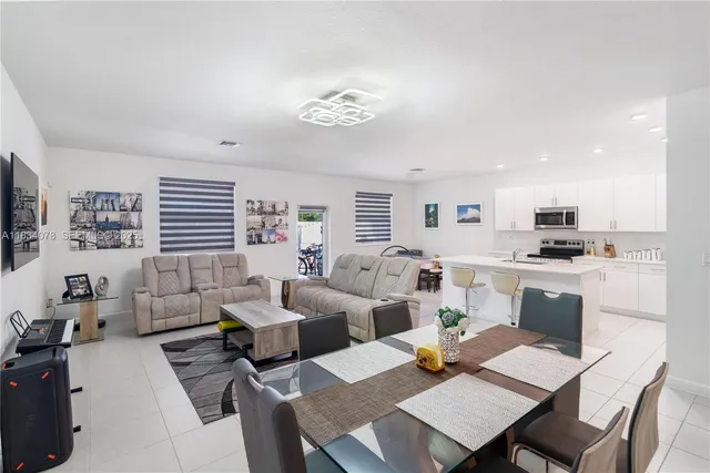 a living room with furniture and a table