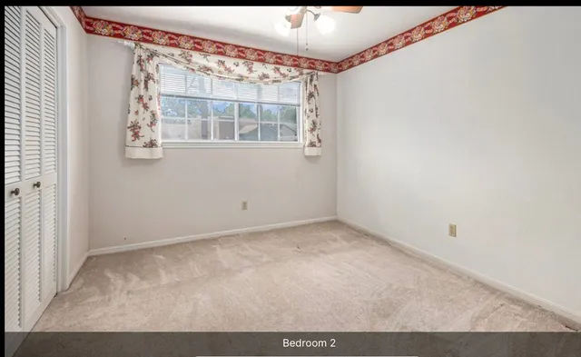 a view of empty room with window