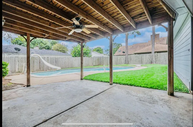 a view of yard with porch