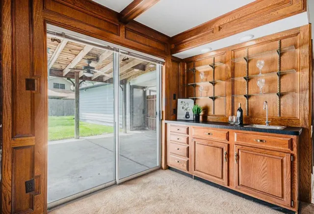 a view of a living room and window