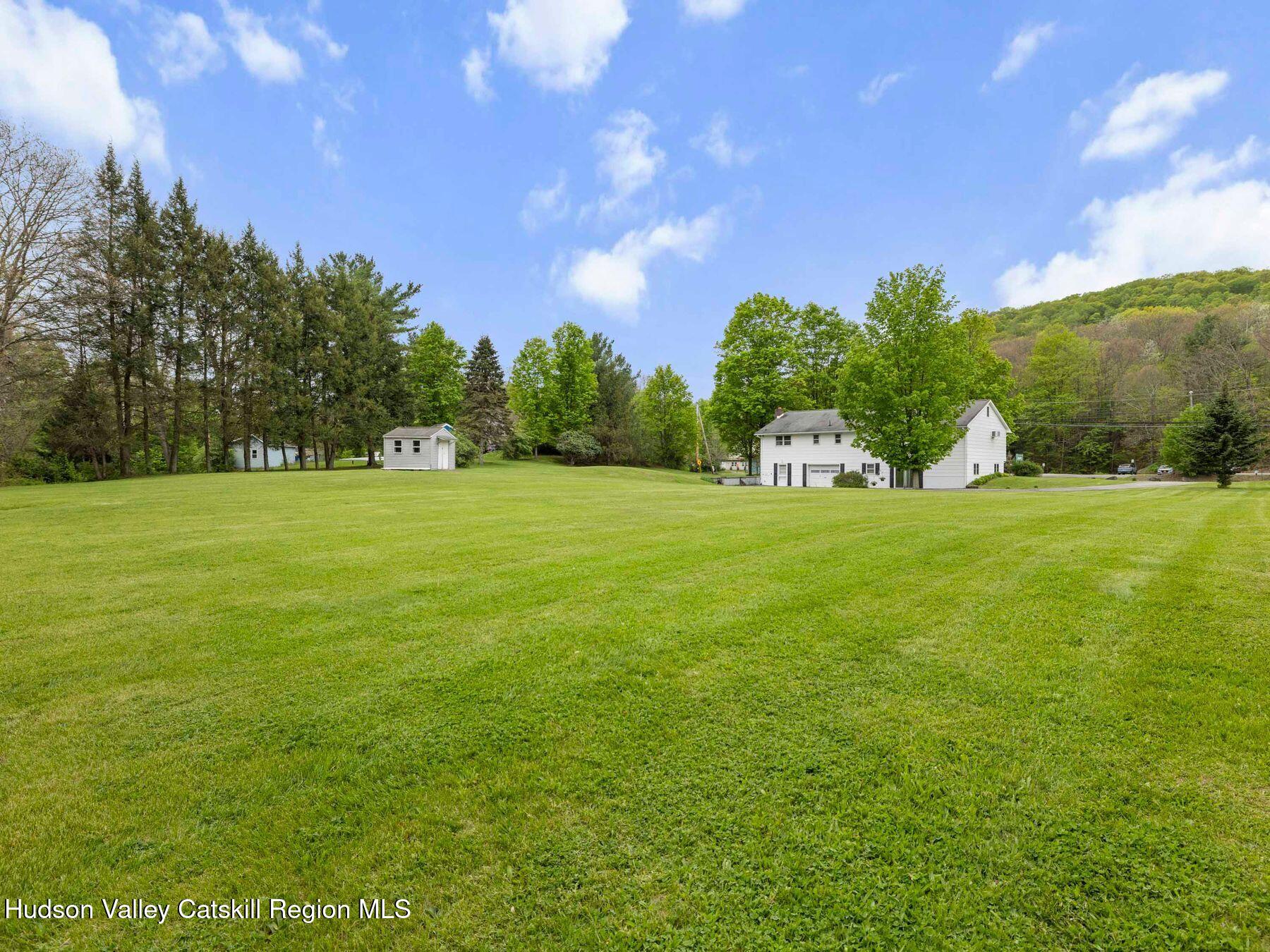104 New Paltz Road Highland, NY 12528 - Photo 39 of 43 a view of a field with trees in the background