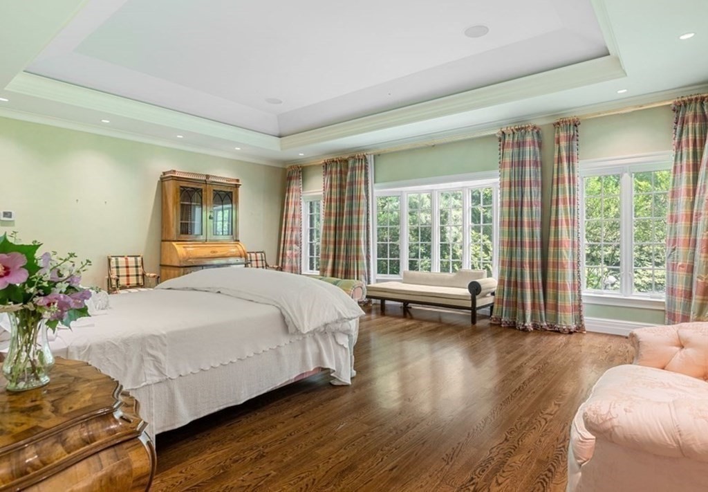 25 Bullard Road Weston, MA 02493 - Photo 20 of 31 a bedroom with a large bed and a large window