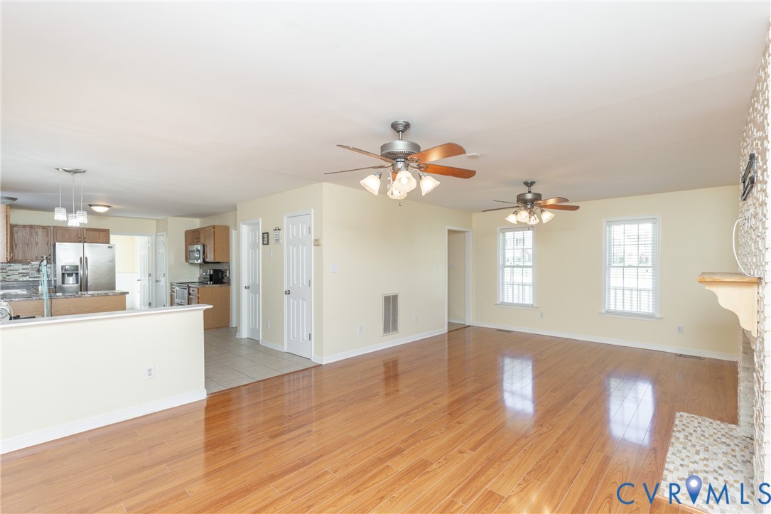 5101 Spring Bluff Road Midlothian, VA 23112 - Photo 10 of 47 Spacious living area featuring polished wood-finis