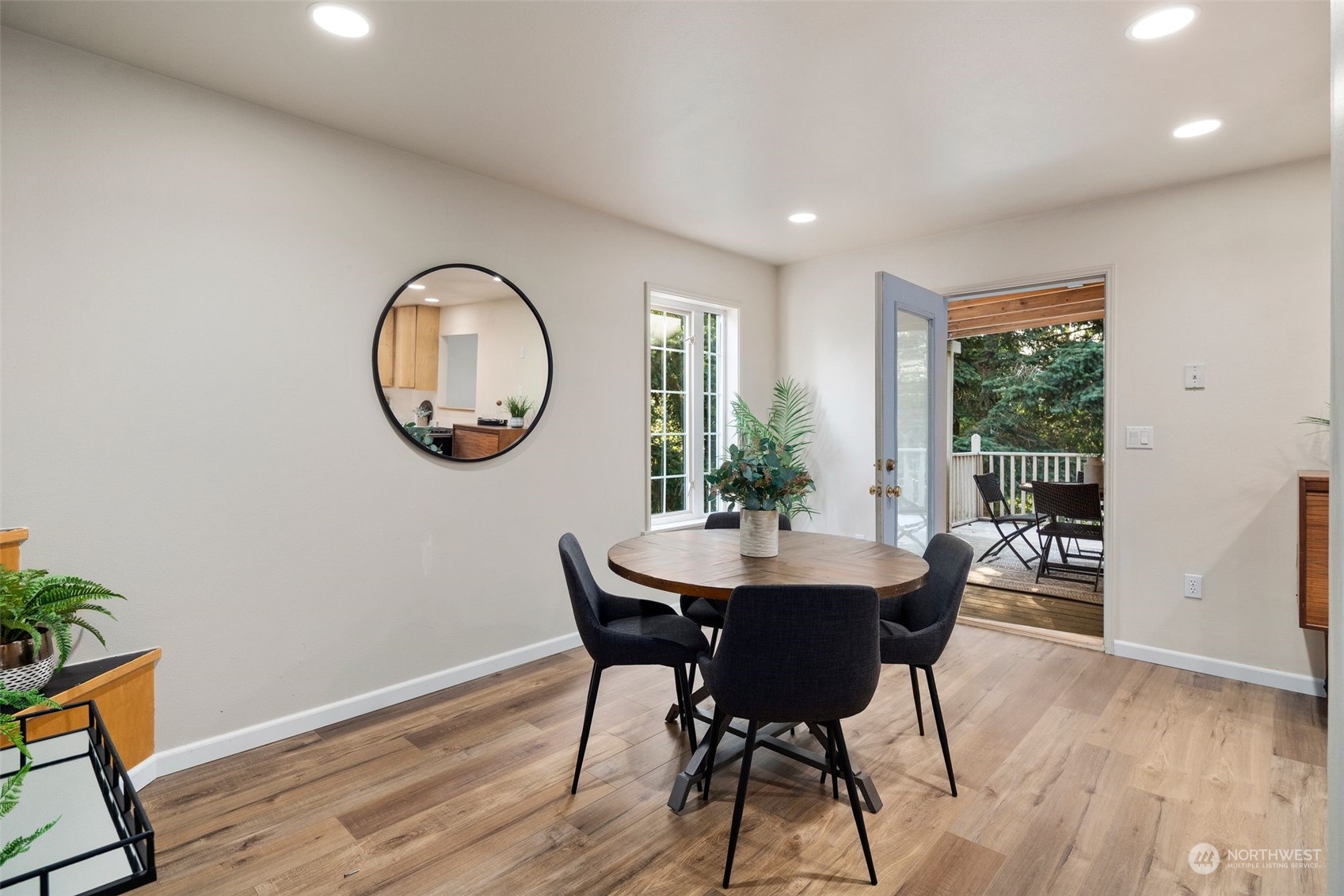 4729 Seahurst Avenue Everett, WA 98203 - Photo 12 of 40 a view of a dining room with furniture and wooden floor