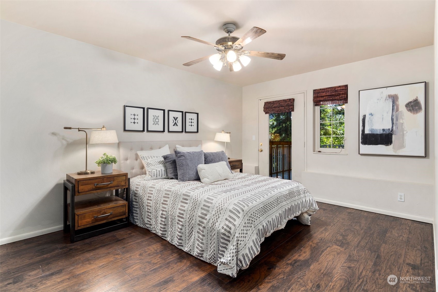 4729 Seahurst Avenue Everett, WA 98203 - Photo 24 of 40 a bedroom with a bed and a chandelier