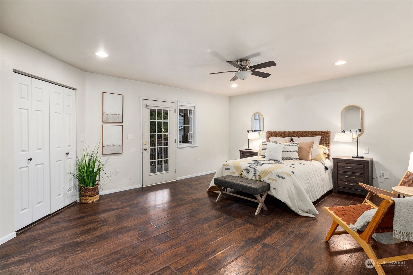 4729 Seahurst Avenue Everett, WA 98203 - Photo 27 of 40 a bed room with a bed and a chandelier