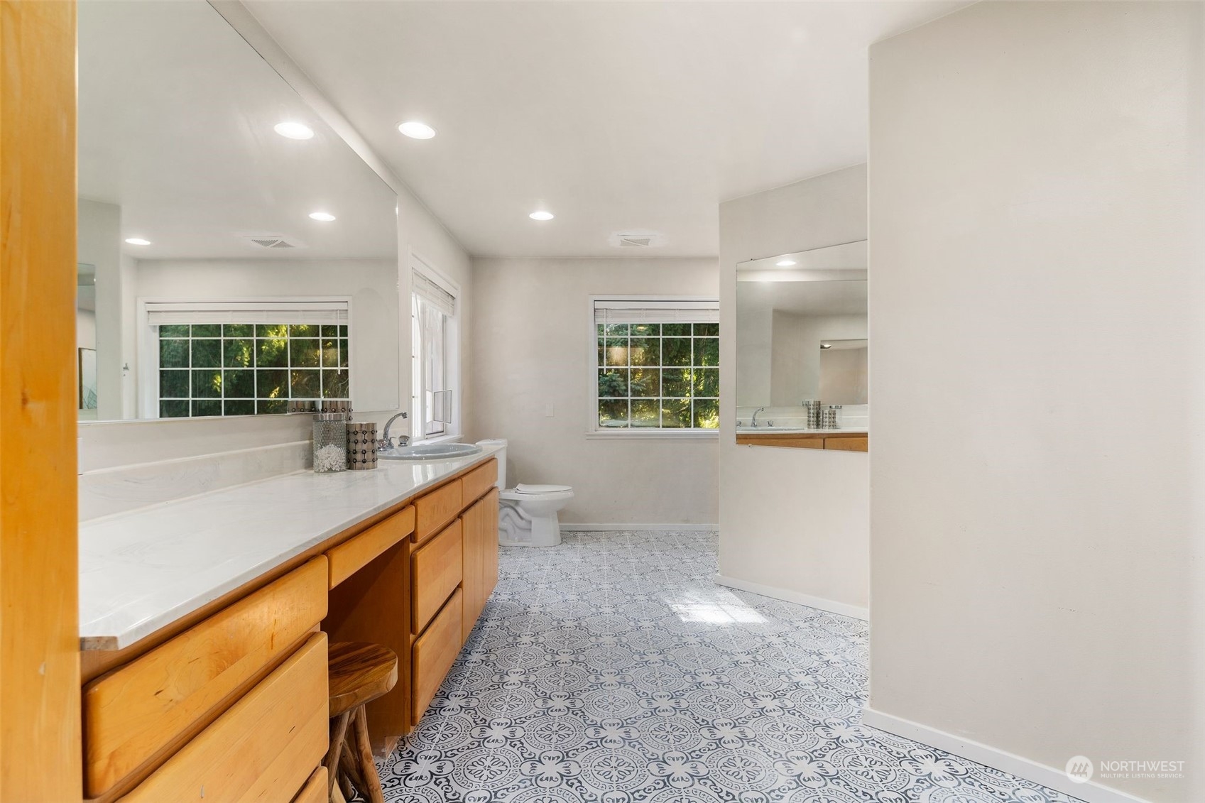 4729 Seahurst Avenue Everett, WA 98203 - Photo 29 of 40 a bathroom with a sink and a mirror