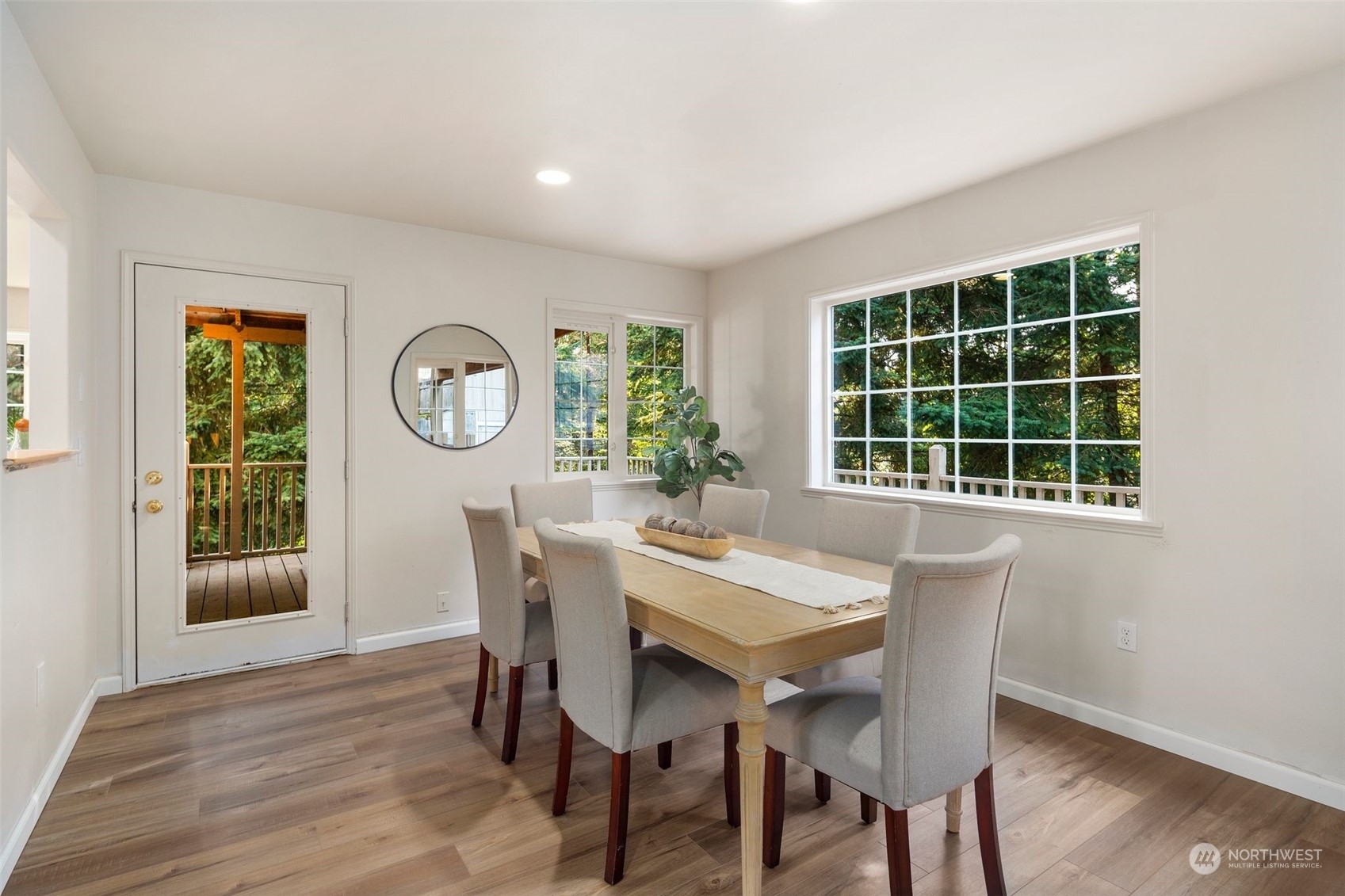 4729 Seahurst Avenue Everett, WA 98203 - Photo 5 of 40 a view of a dining room with furniture window and wooden floor