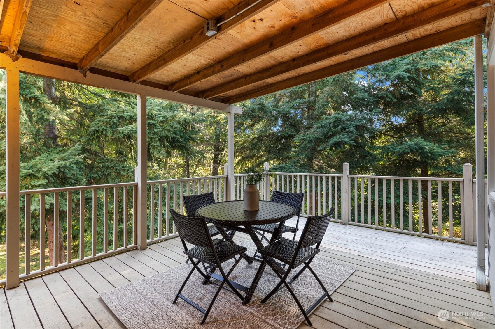 4729 Seahurst Avenue Everett, WA 98203 - Photo 9 of 40 a view of a deck with furniture and wooden floor