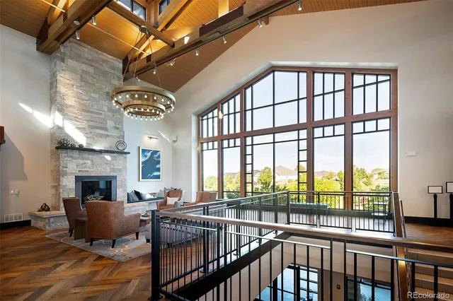 a view of a living room and balcony
