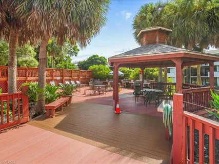 a view of outdoor space yard deck patio and outdoor kitchen