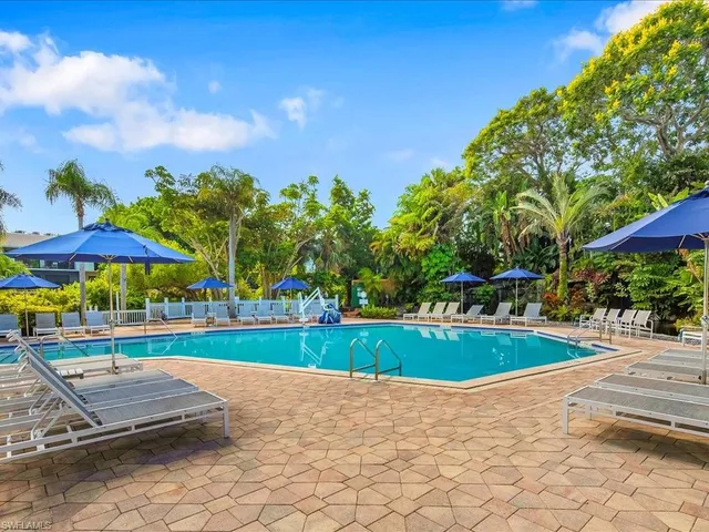 a view of a playground with basketball court