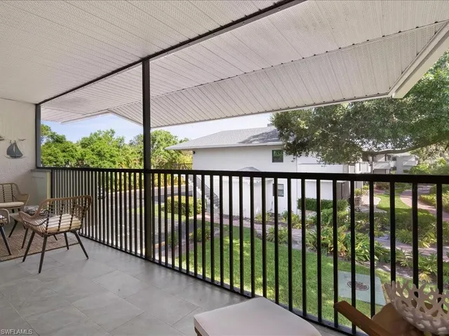 a balcony with an outdoor space