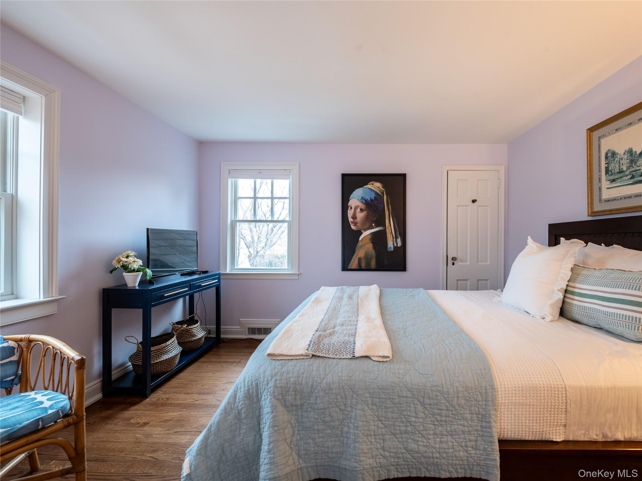 126 Northwoods Road Manhasset, NY 11030 - Photo 13 of 26 a bedroom with a bed and a window