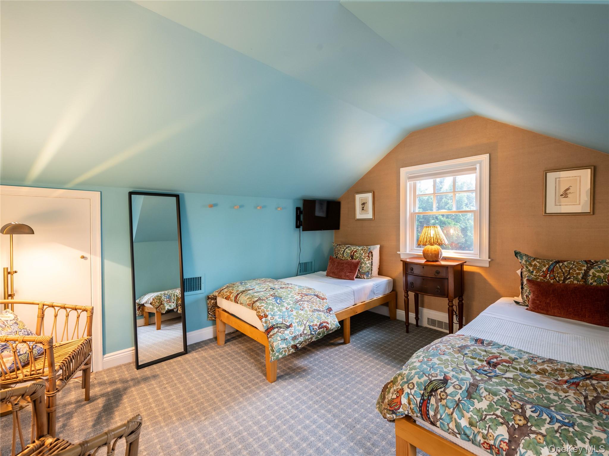 126 Northwoods Road Manhasset, NY 11030 - Photo 16 of 26 a bedroom with a bed and wooden floor