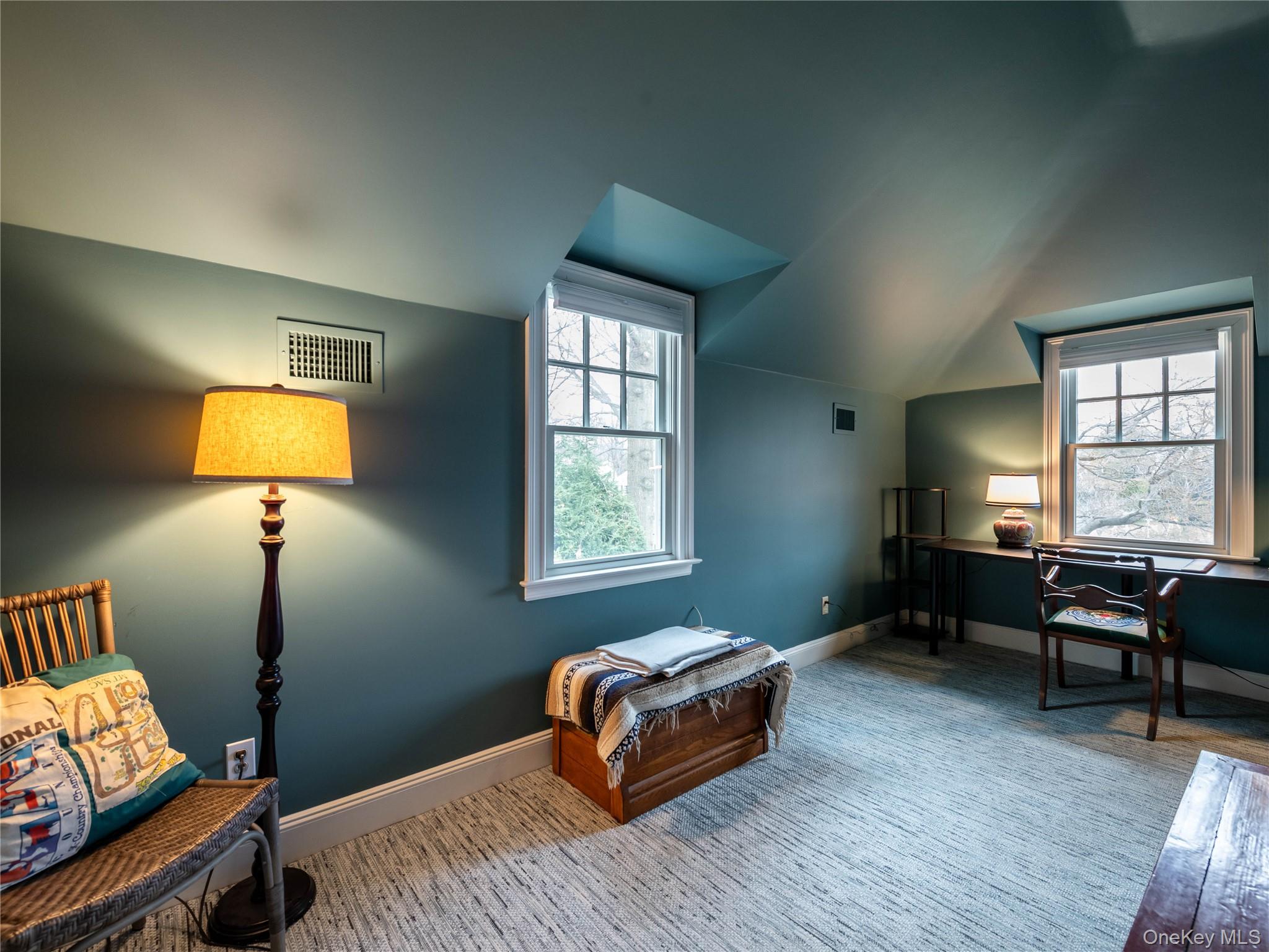 126 Northwoods Road Manhasset, NY 11030 - Photo 19 of 26 a bedroom with furniture and a window