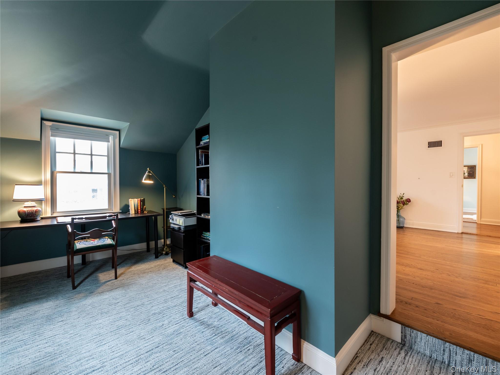 126 Northwoods Road Manhasset, NY 11030 - Photo 20 of 26 a bedroom with furniture and a window