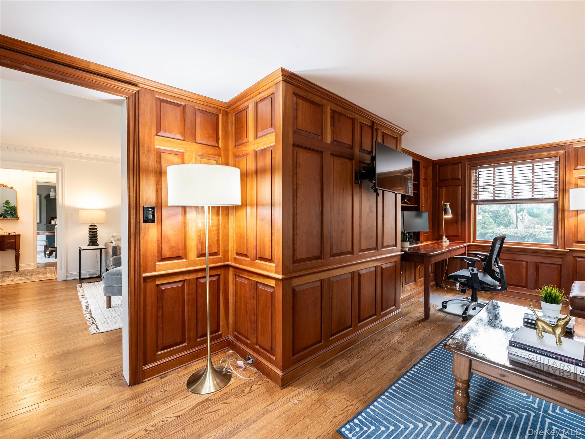 126 Northwoods Road Manhasset, NY 11030 - Photo 7 of 26 a kitchen with stainless steel appliances granite countertop a refrigerator dining table and chairs