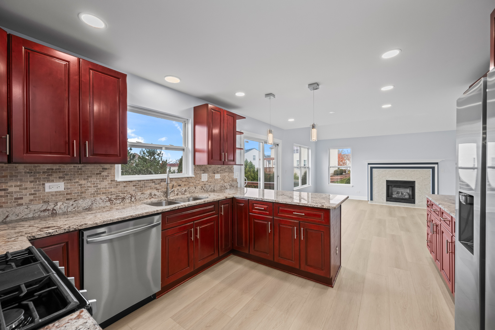 400 Diamond Back Way Algonquin, IL 60102 - Photo 4 of 23 a kitchen with stainless steel appliances granite countertop a sink and cabinets