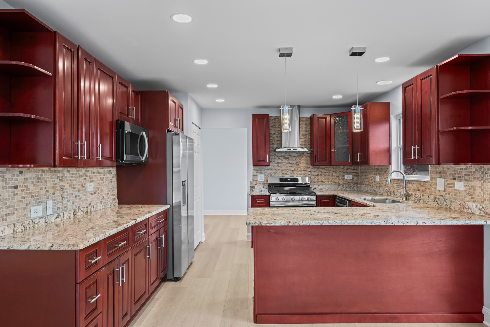 400 Diamond Back Way Algonquin, IL 60102 - Photo 5 of 23 a kitchen with stainless steel appliances granite countertop a sink stove and cabinets