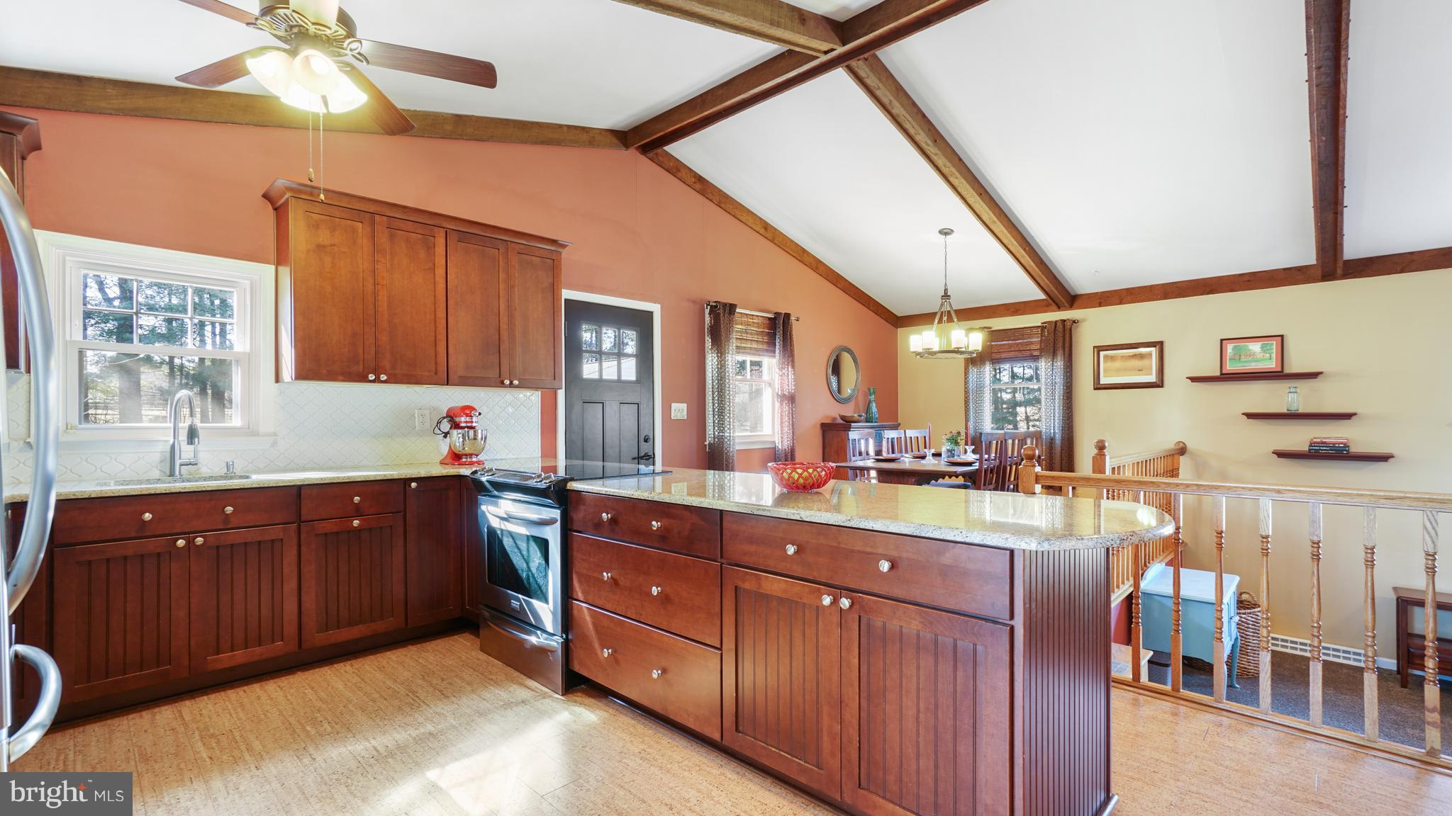 Granite counyers w/ stainless appls +  cork floor