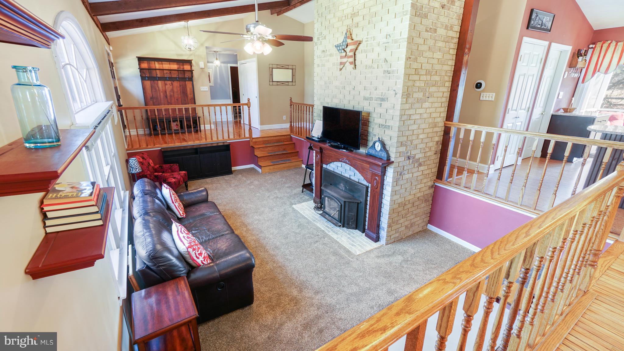 14931 Old York Road Phoenix, MD 21131 - Photo 4 of 25 Living Room w/ floor to ceil brick fireplace
