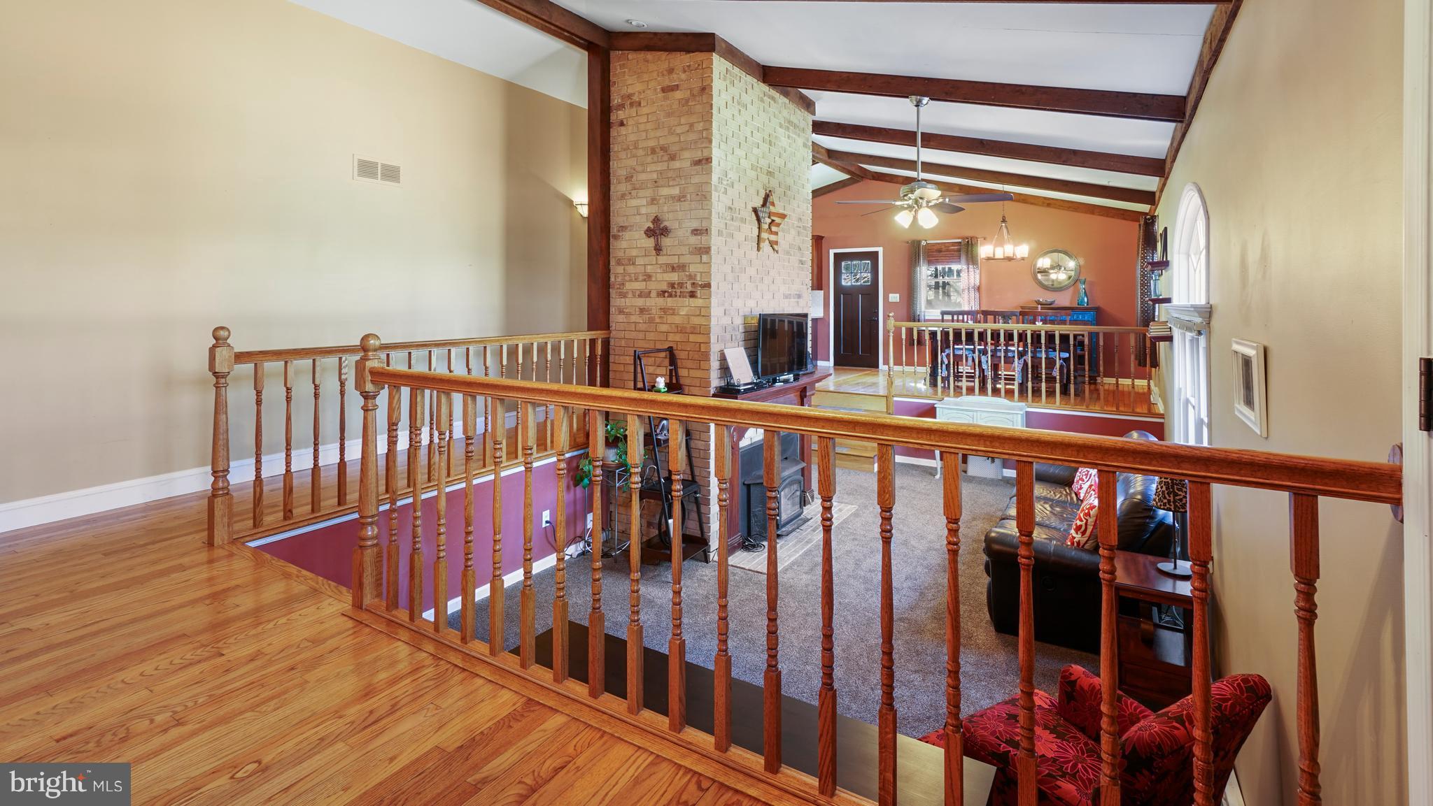 14931 Old York Road Phoenix, MD 21131 - Photo 5 of 25 Sunken living room with surround walkway