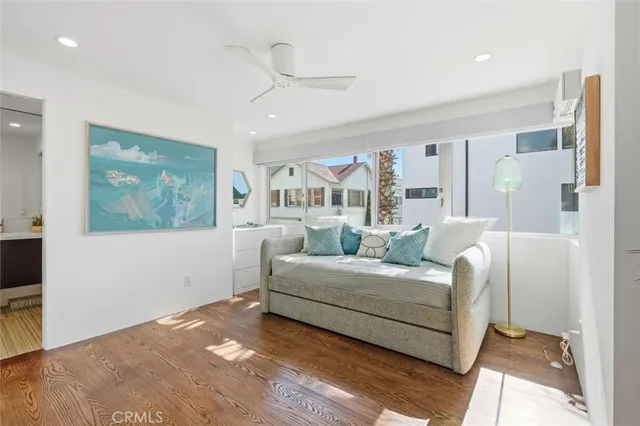 a kitchen with a table chairs stove and refrigerator