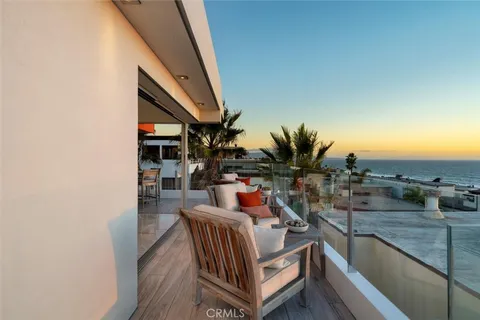 an aerial view of a building with outdoor space