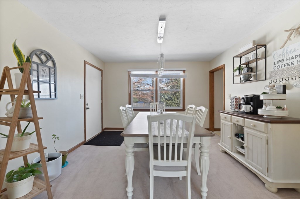 100 Barry Road Worcester, MA 01609 - Photo 11 of 37 a view of a dining room with furniture window and outside view