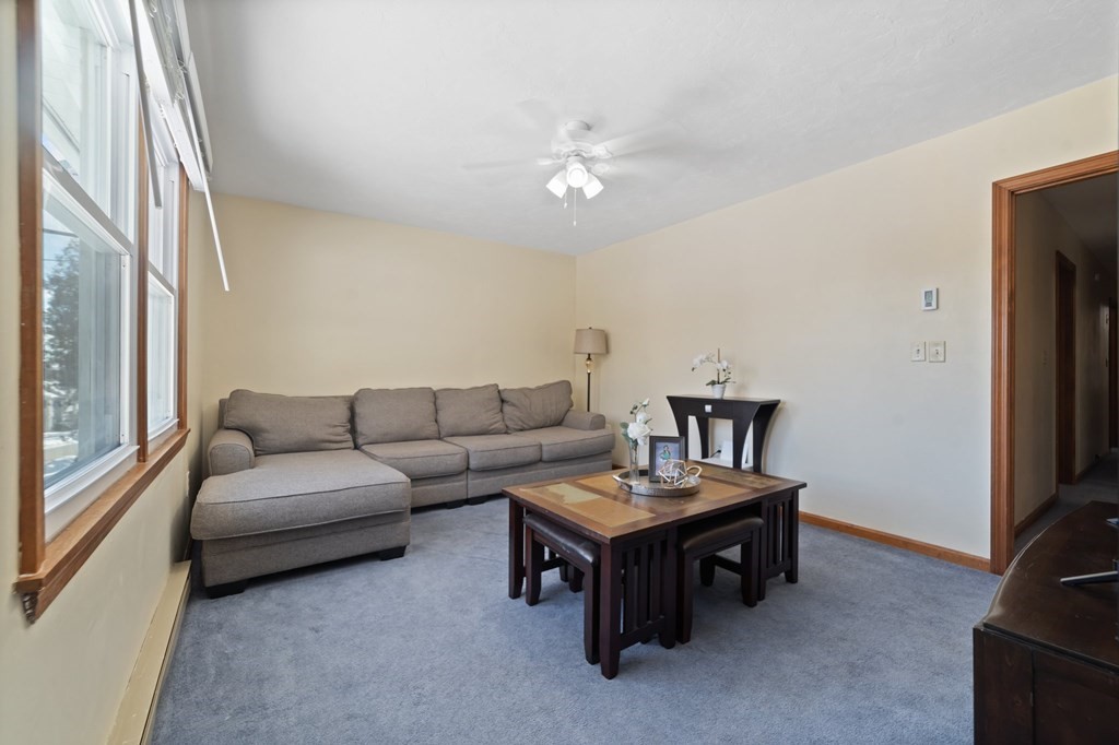 100 Barry Road Worcester, MA 01609 - Photo 17 of 37 a living room with furniture and a flat screen tv