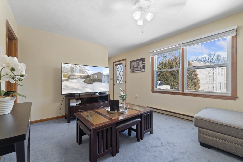 100 Barry Road Worcester, MA 01609 - Photo 18 of 37 a living room with furniture and a flat screen tv