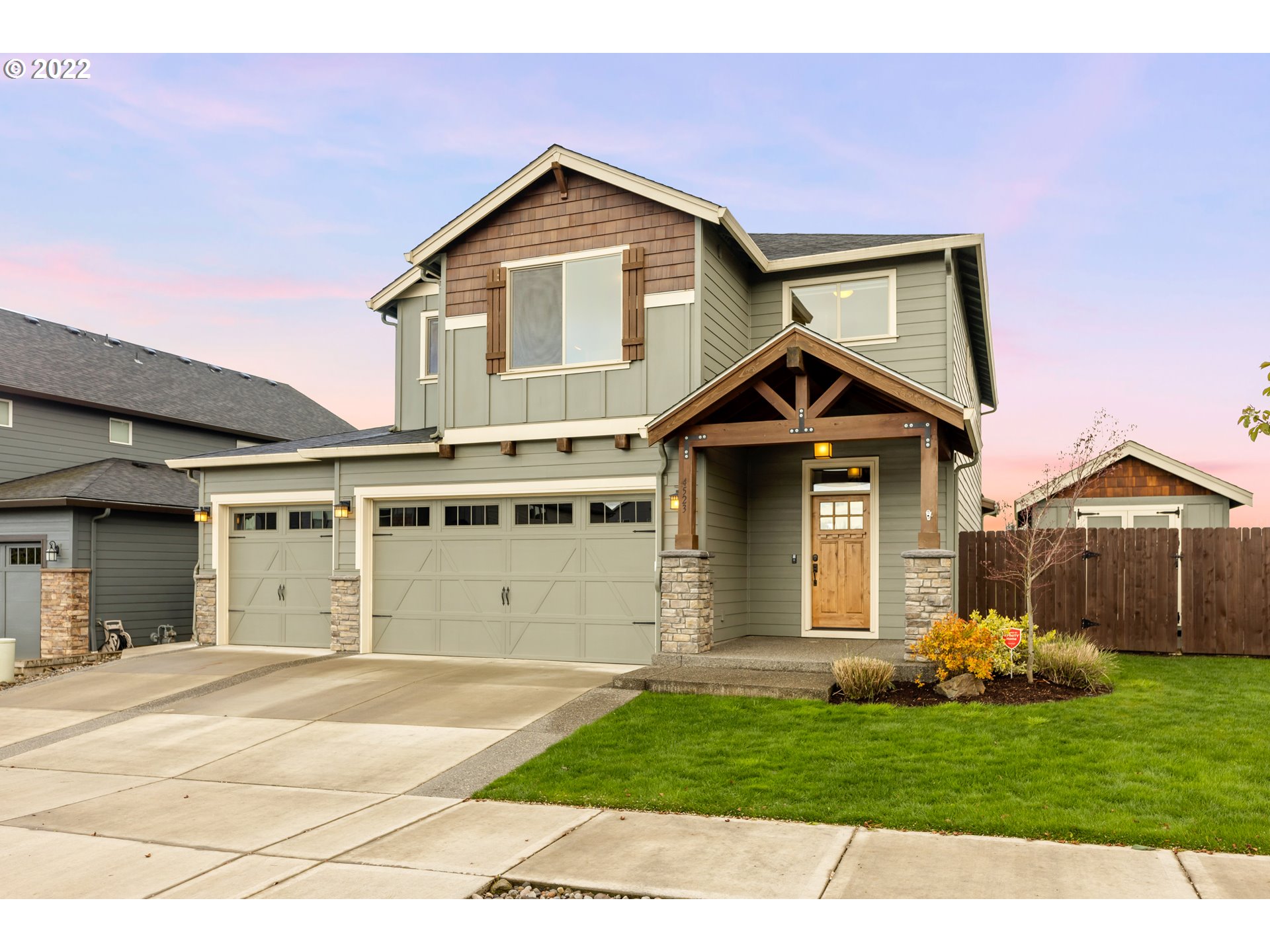 4523 North 9th Street Ridgefield, WA 98642 - Photo 1 of 32 a front view of a house with a yard and garage