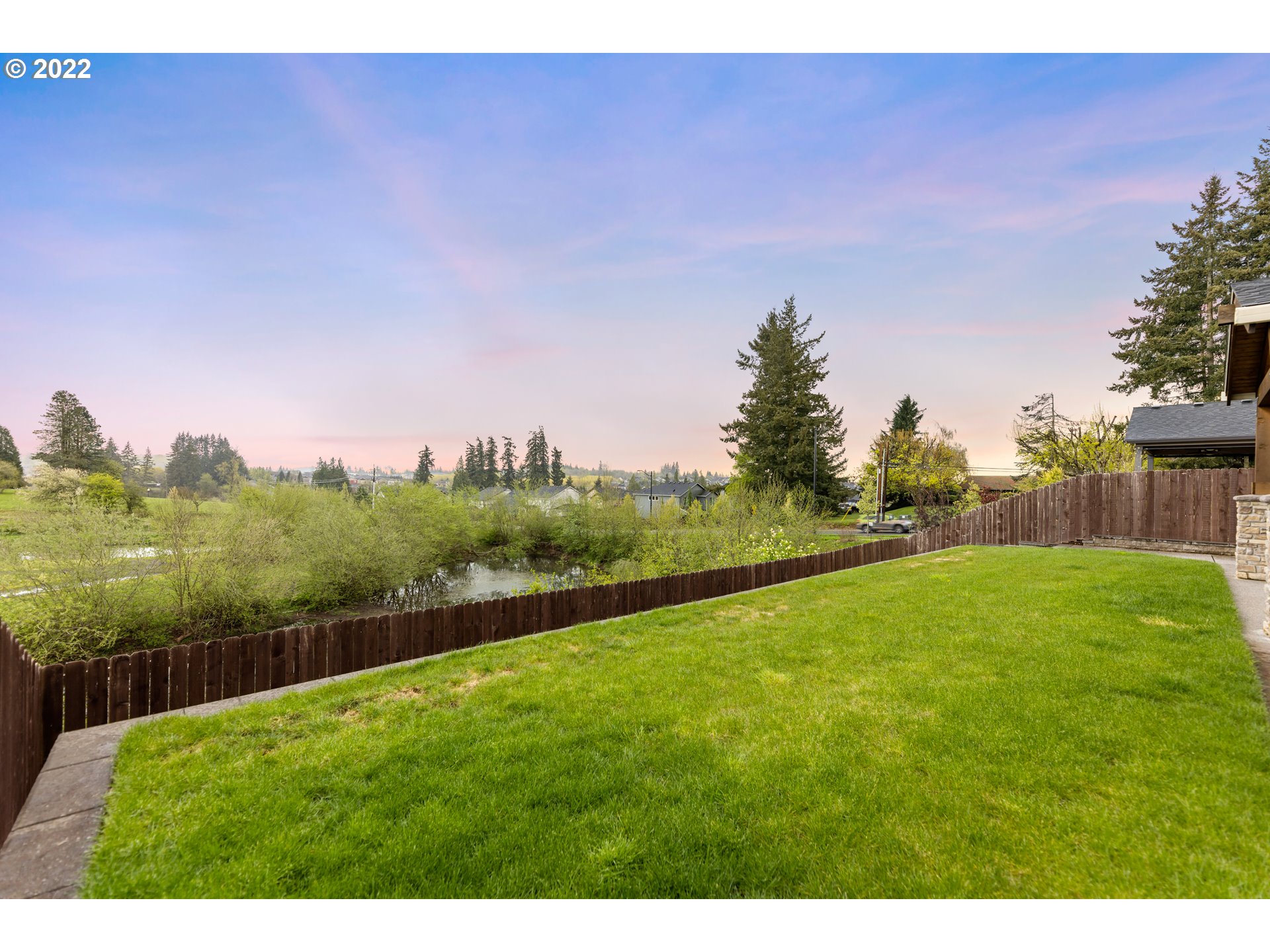 4523 North 9th Street Ridgefield, WA 98642 - Photo 30 of 32 a backyard of a house with table and chairs