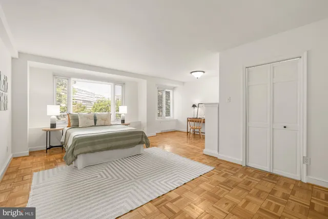 a work room with furniture and window