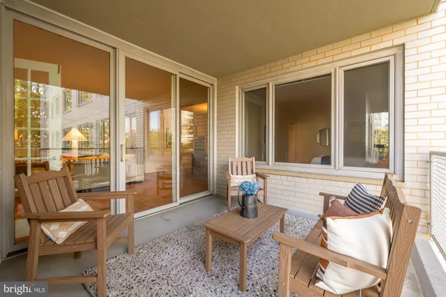 a view of a terrace with chairs