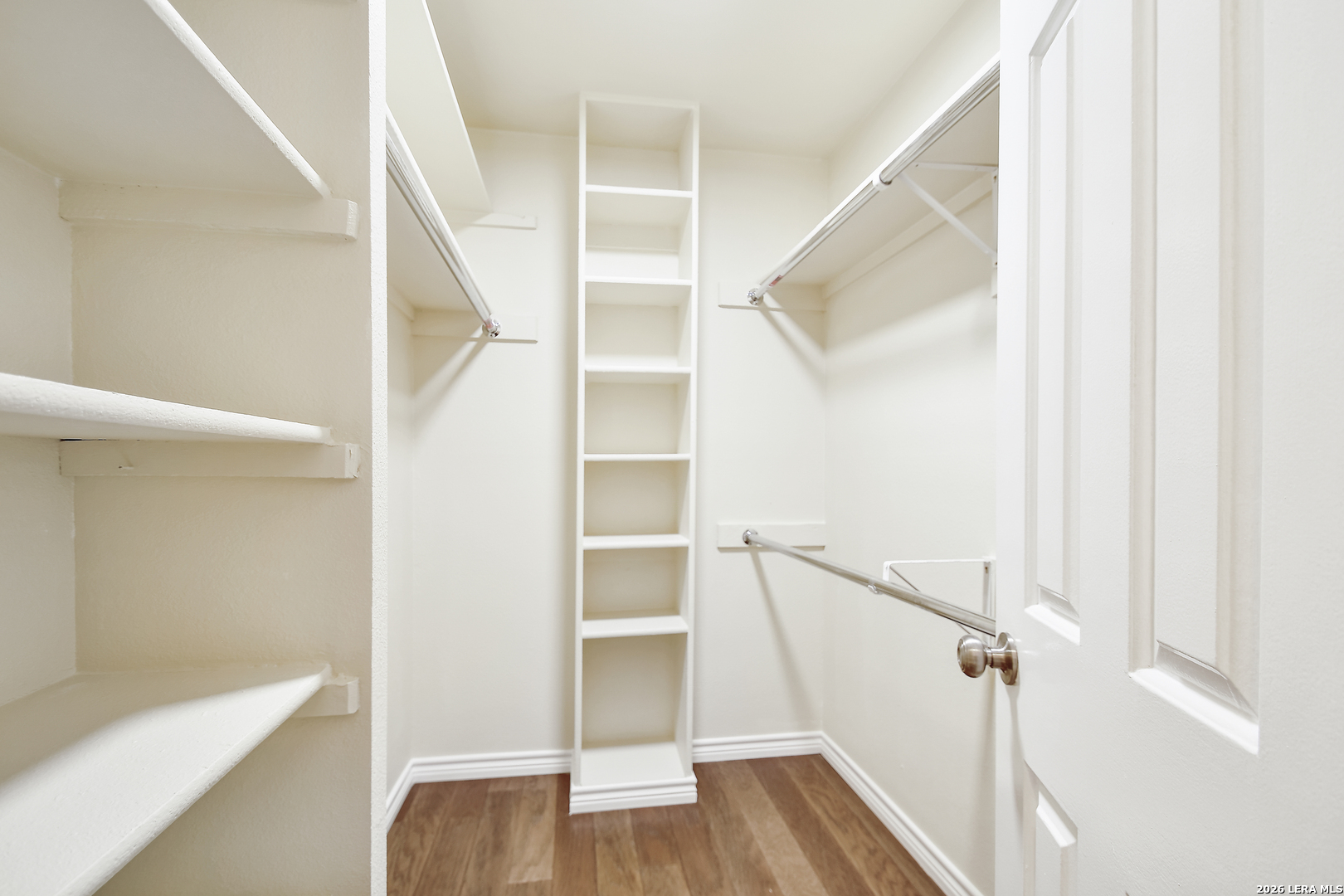 13130 Blanco Road, Unit 1706 San Antonio, TX 78216 - Photo 15 of 23 a view of staircase with white walls and a window