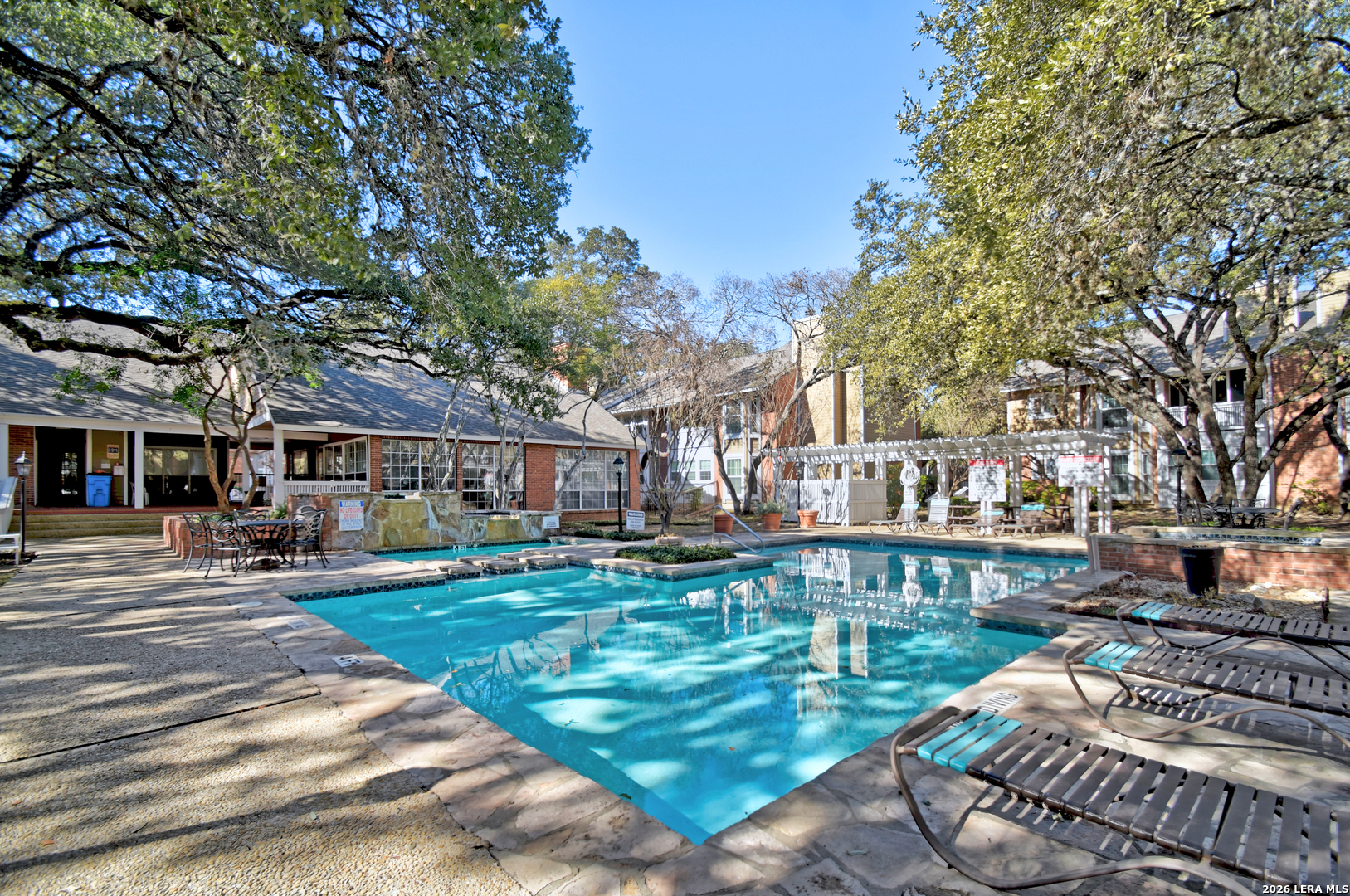 13130 Blanco Road, Unit 1706 San Antonio, TX 78216 - Photo 17 of 23 a front view of a building with garden