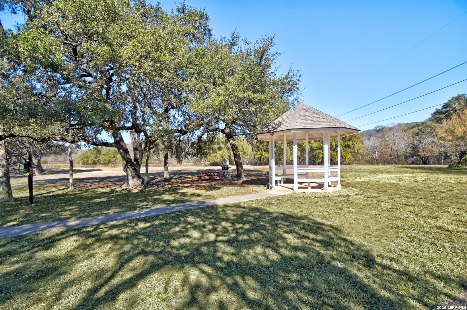 13130 Blanco Road, Unit 1706 San Antonio, TX 78216 - Photo 22 of 23 a view of a house with backyard porch and sitting area