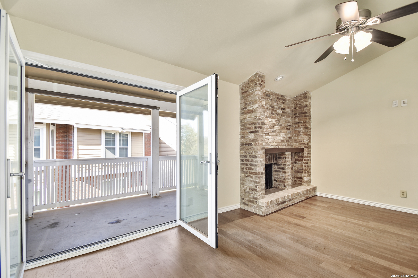 13130 Blanco Road, Unit 1706 San Antonio, TX 78216 - Photo 4 of 23 a view of livingroom with furniture wooden floor fan and window