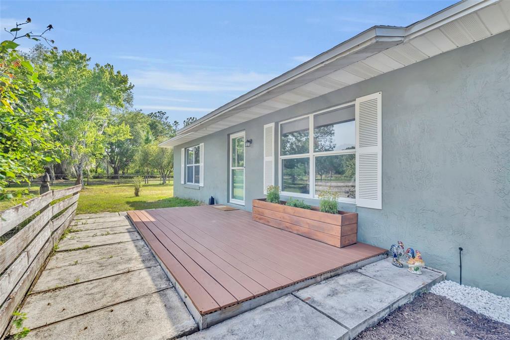 430 Cypress Isles Road Osteen, FL 32764 - Photo 5 of 55 a view of swimming pool with a lounge chair