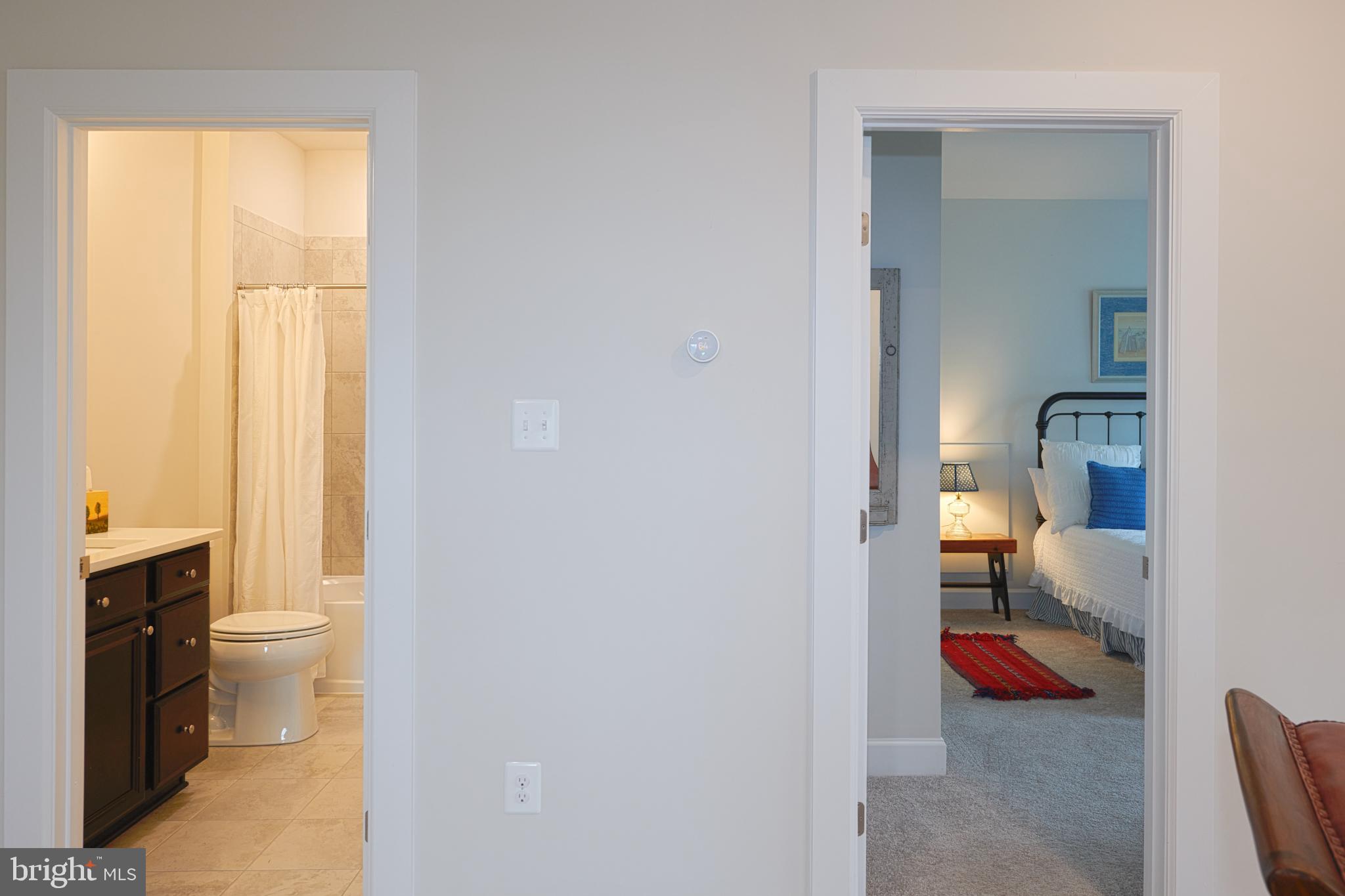 33173 Ponte Vecchio Plaza Ocean View, DE 19970 - Photo 16 of 19 a bathroom with a toilet and a shower