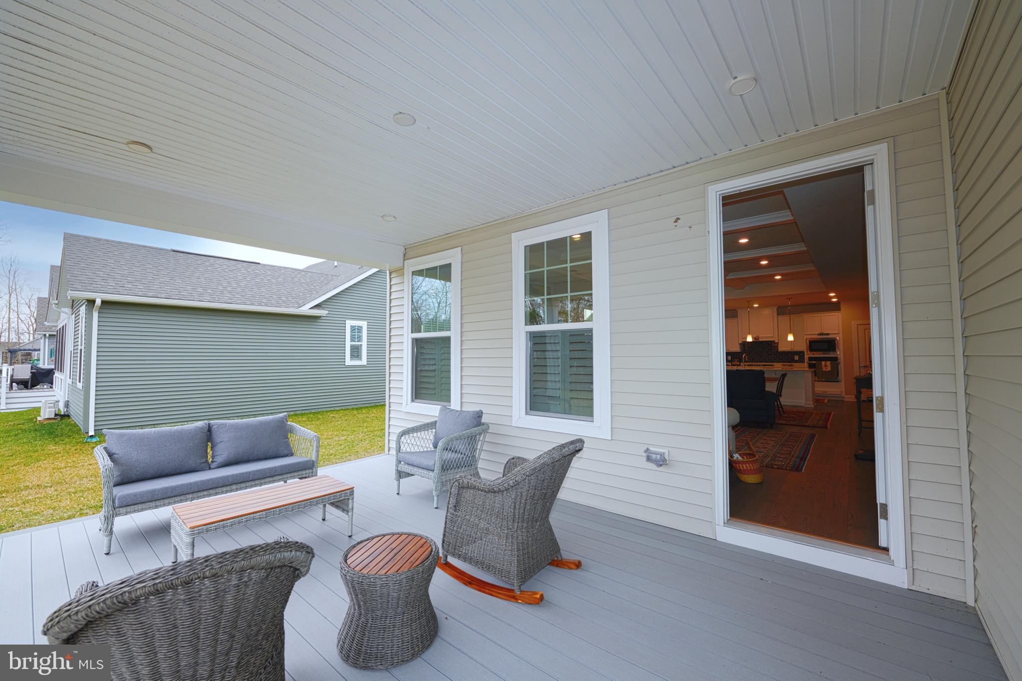 33173 Ponte Vecchio Plaza Ocean View, DE 19970 - Photo 18 of 19 a living room with furniture and window